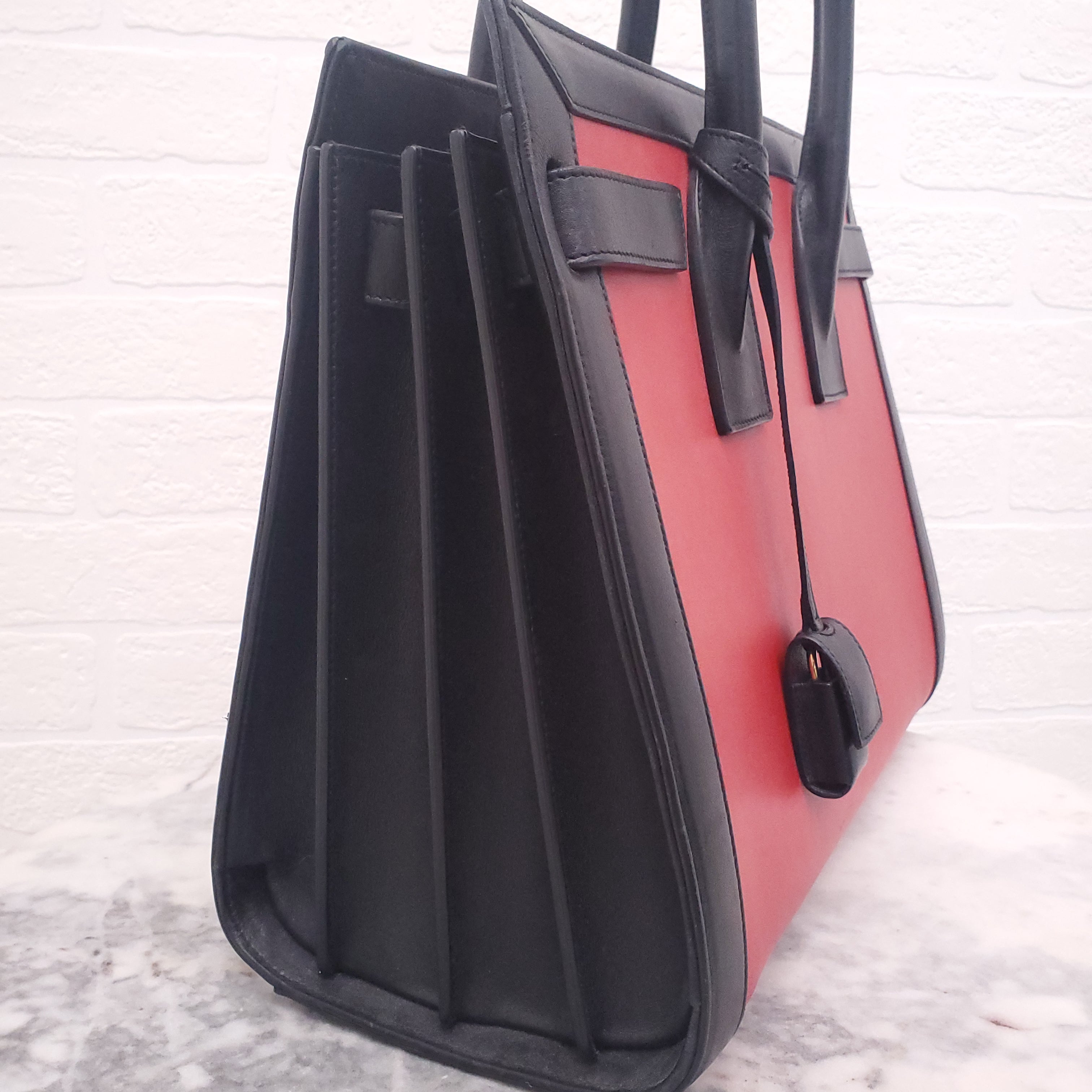 SAINT LAURENT RED AND BLACK SAC DE JOUR