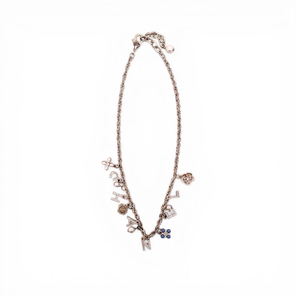 CHANEL GOLD LETTER CRYSTAL FLOWER CHAIN NECKLACE
