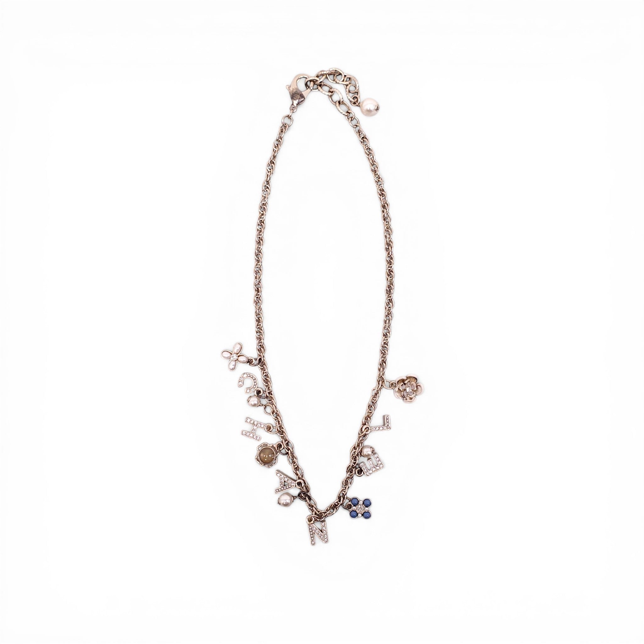 CHANEL GOLD LETTER CRYSTAL FLOWER CHAIN NECKLACE