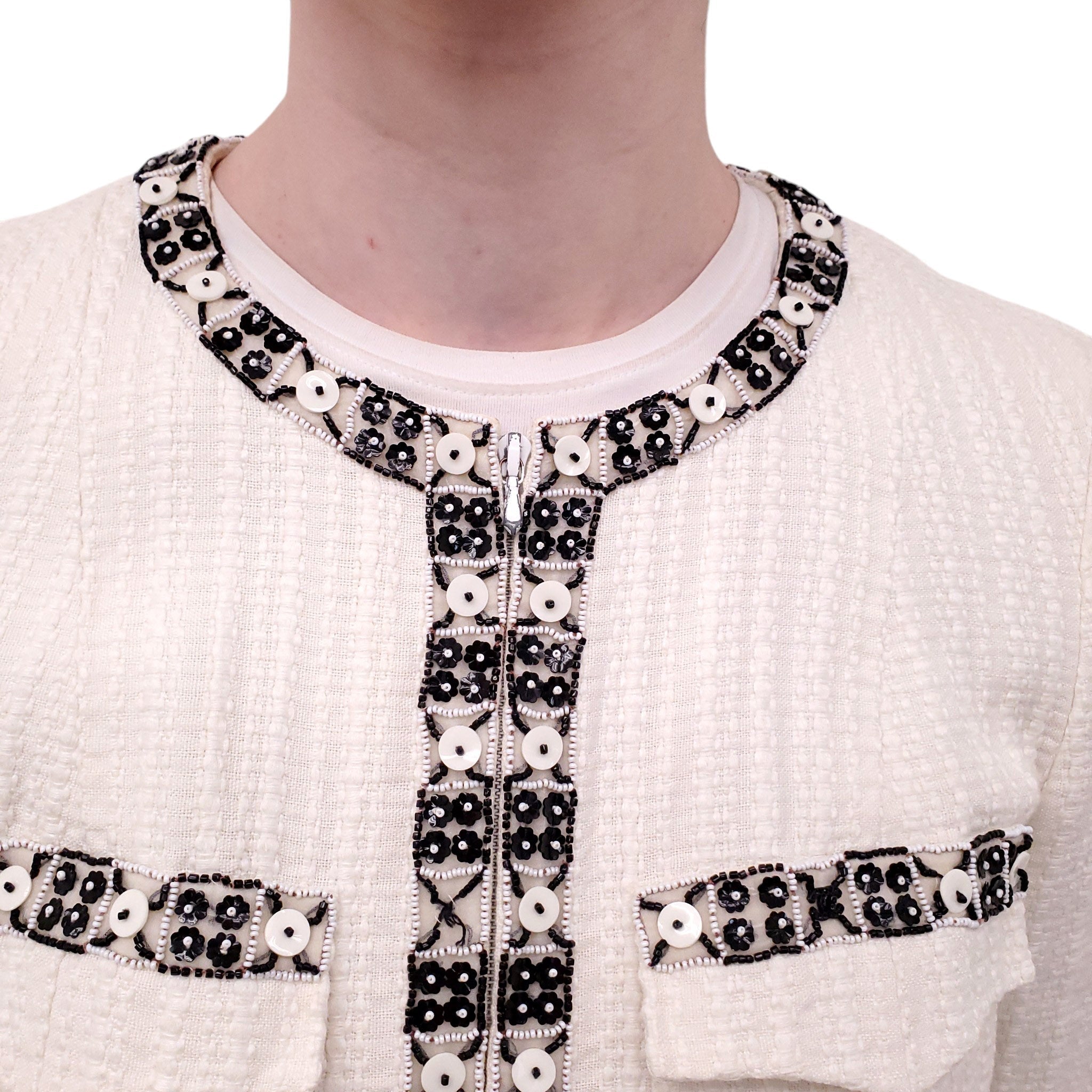 CHANEL CREAM ZIP UP JACKET WITH FLORAL BEADED TRIM AND LOGO DETAIL - SIZE 40