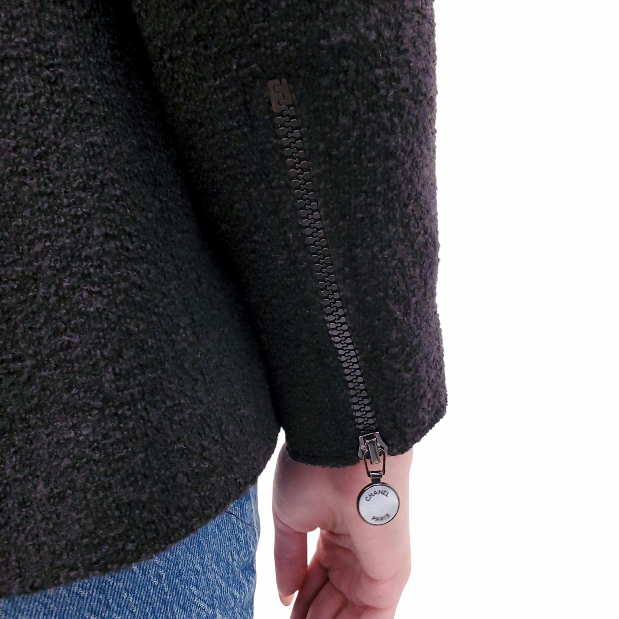 CHANEL BLACK PEPLUM TWEED JACKET WITH MOTHER OF PEARL LOGO BUTTONS AND SLEEVE ZIPPER - SIZE 38