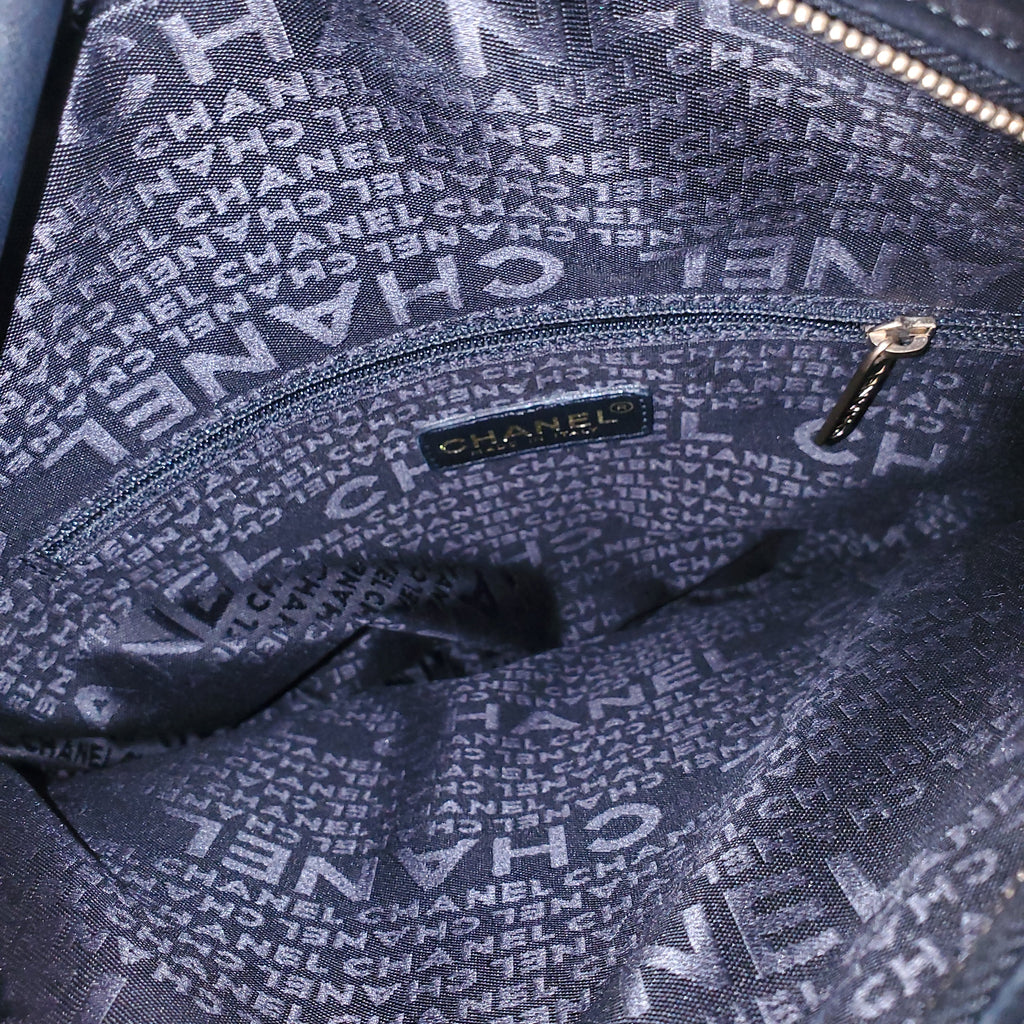CHANEL VINTAGE BLACK ROUND CC WRISTLET