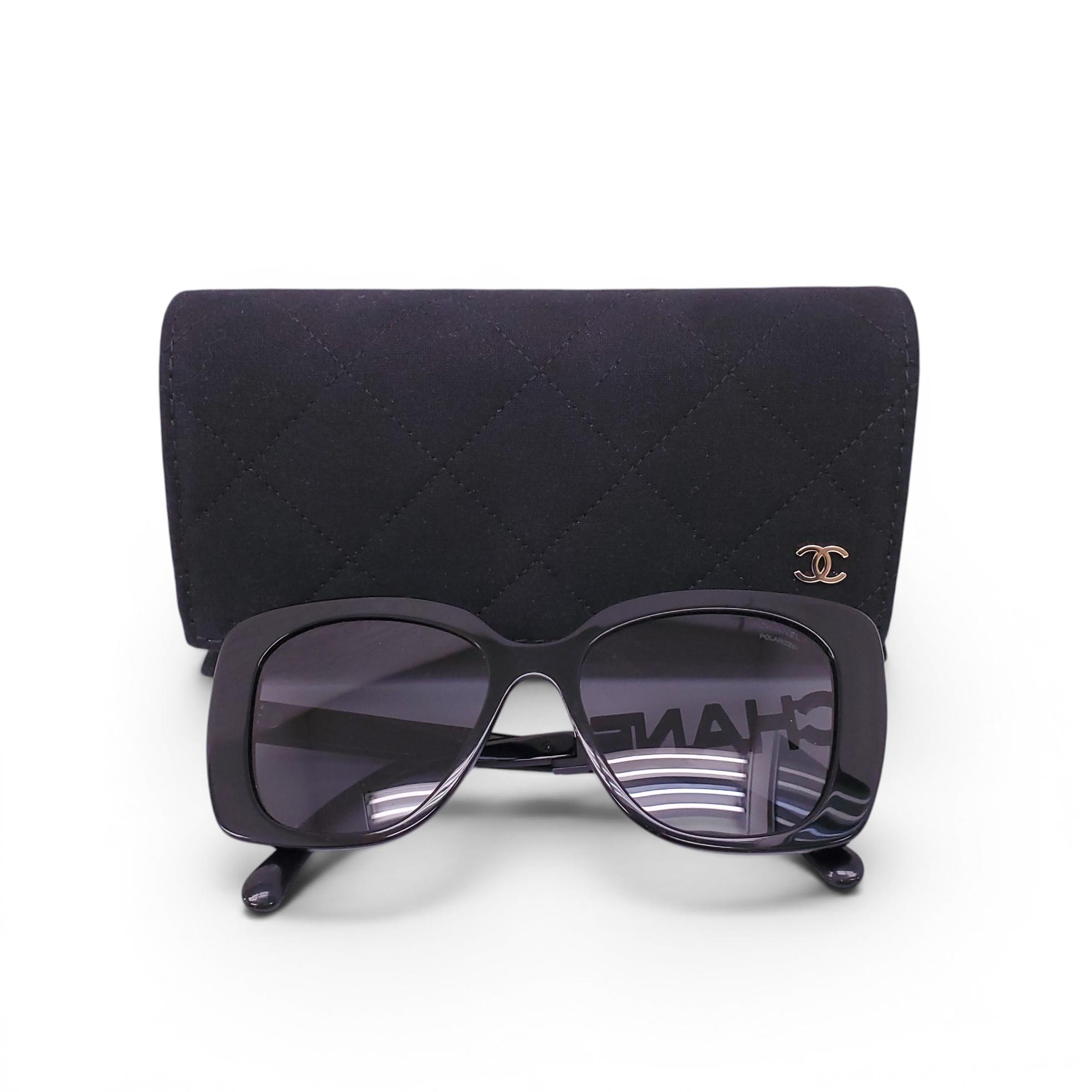 CHANEL BLACK SUNGLASSES WITH CRYSTAL LOGO DETAIL