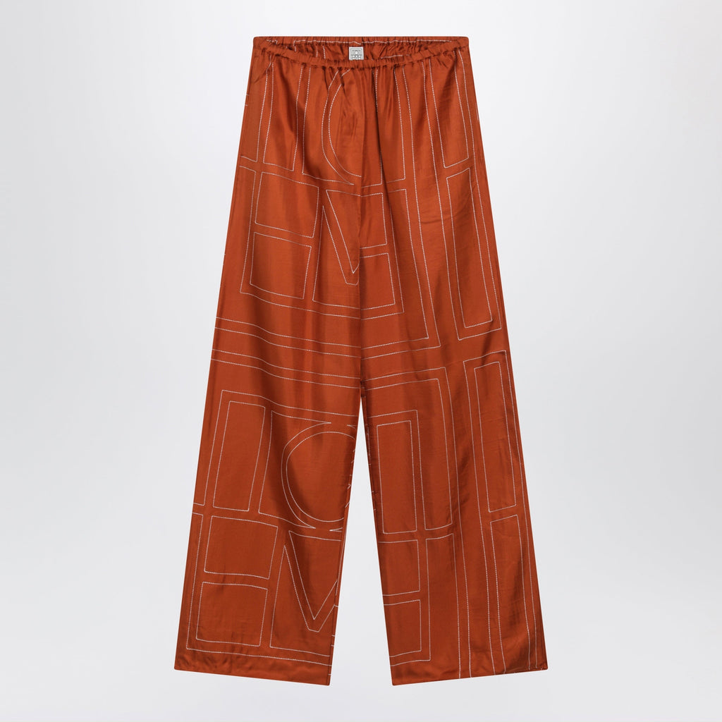Toteme Monogram Silk Pajama Trousers In Terracotta Women
