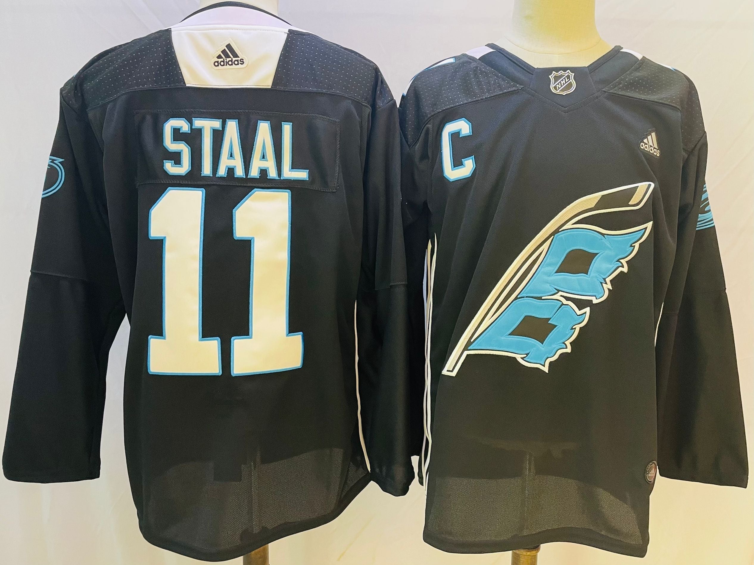 Men's Carolina Hurricanes Jordan Staal #11 Black Home Breakaway Player jersey