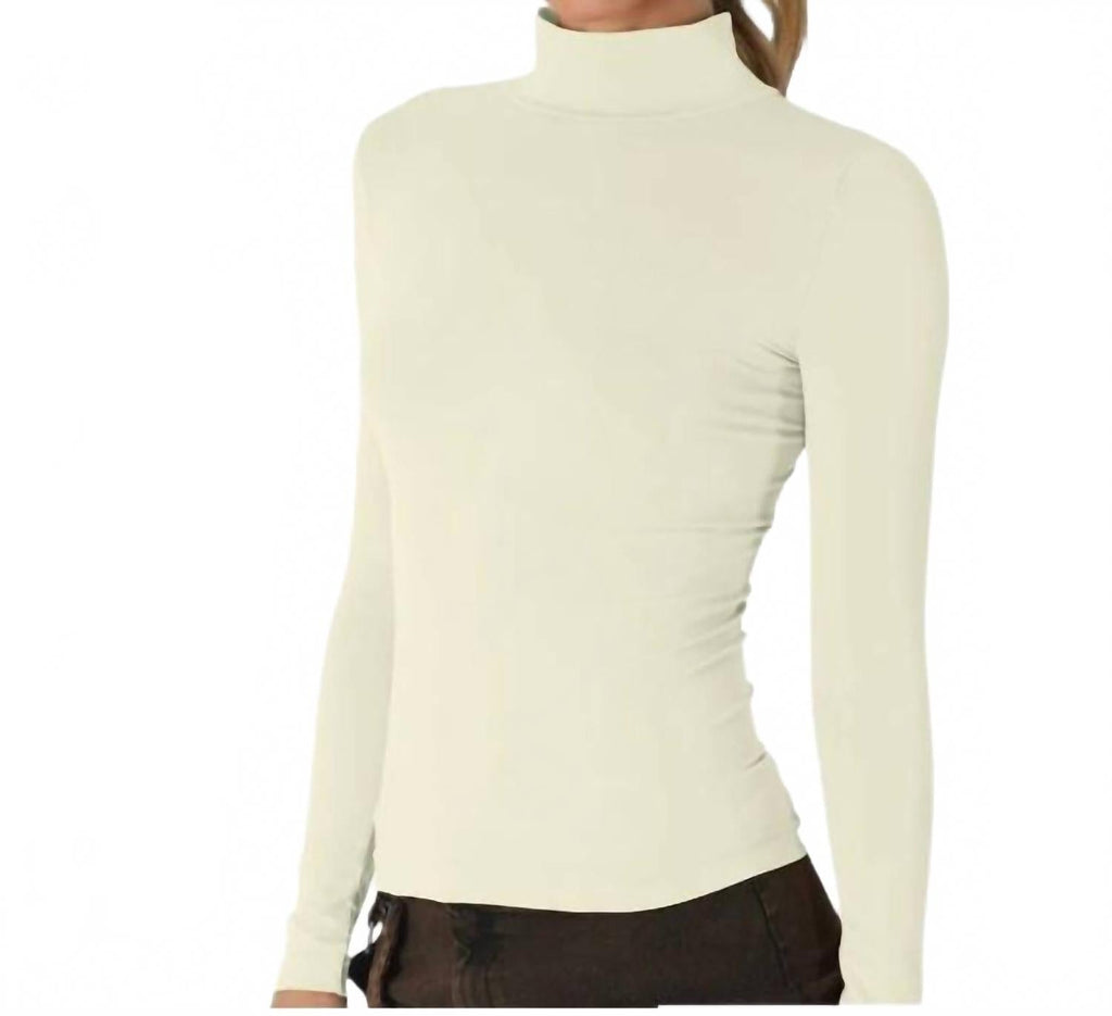 Long Sleeve Mock Neck Top In Butter Cream