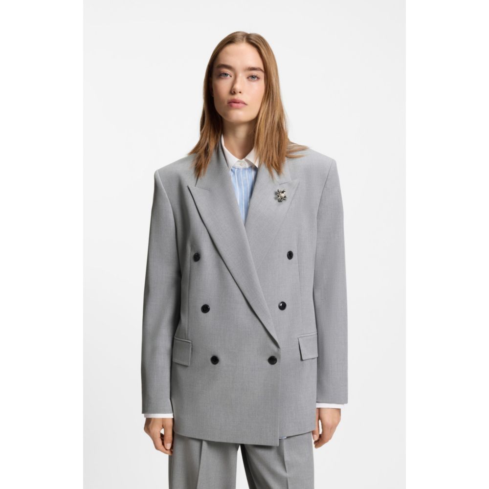 Relaxed-fit blazer with enamel flower brooch