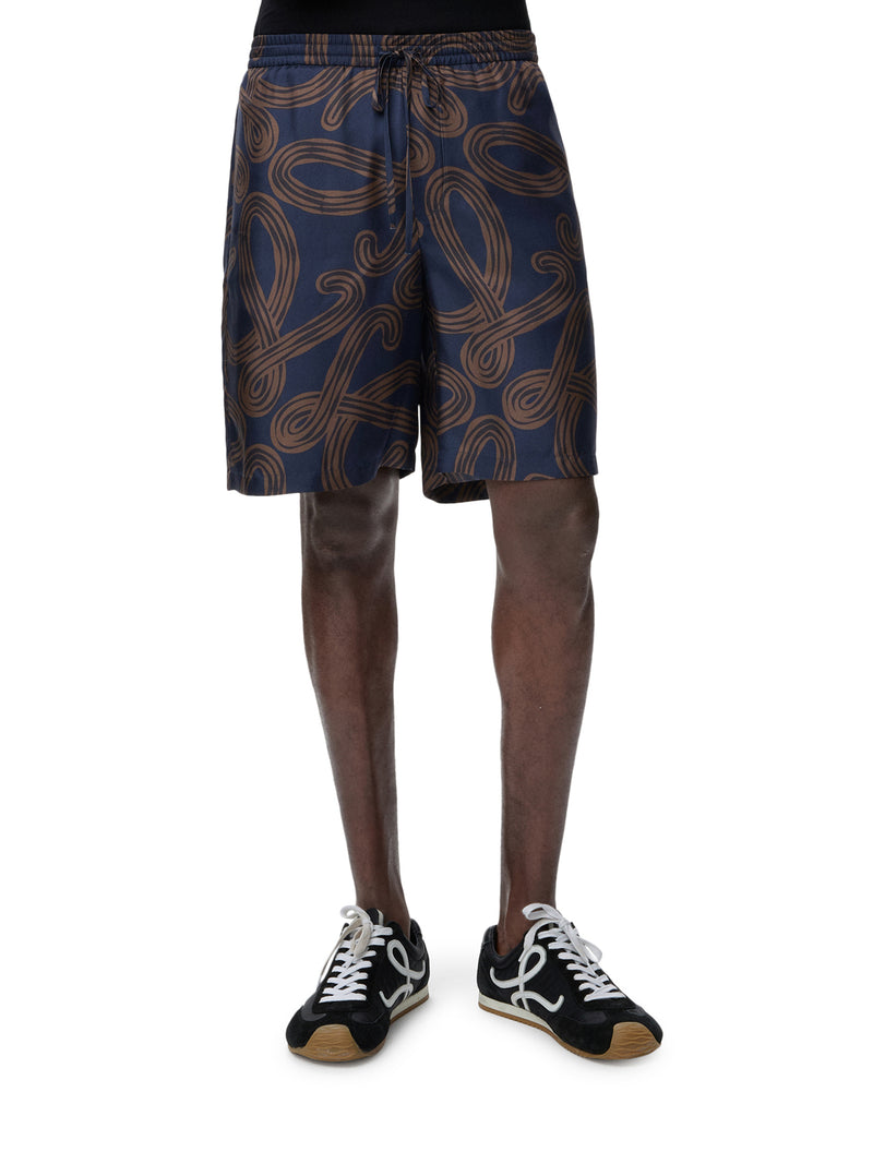 Loewe X Paula`S Ibiza Men Silk Twill Shorts With All-Over Anagram Print