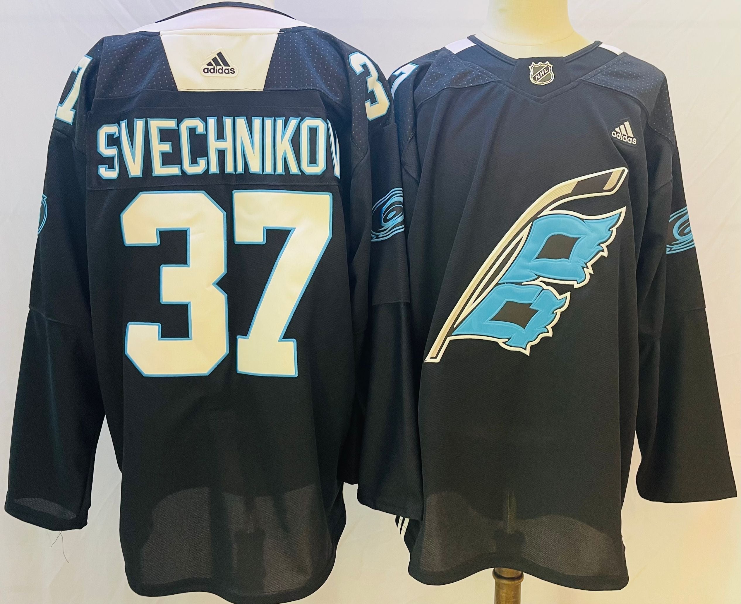 Men's Carolina Hurricanes Andrei Svechnikov #37 Black Home Breakaway jersey