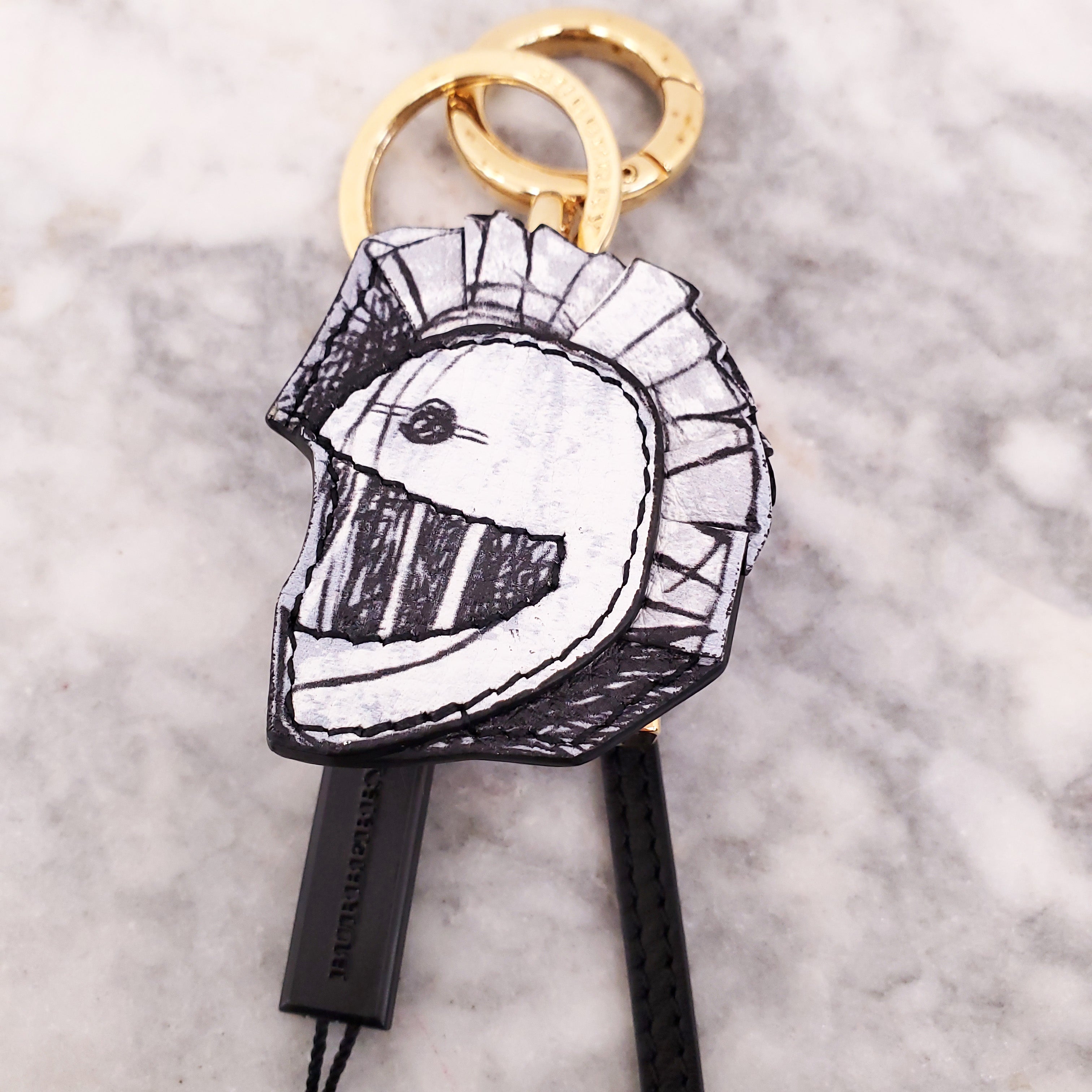 BURBERRY BLACK LEATHER ‘PALLAS HELMET’ KEYCHAIN