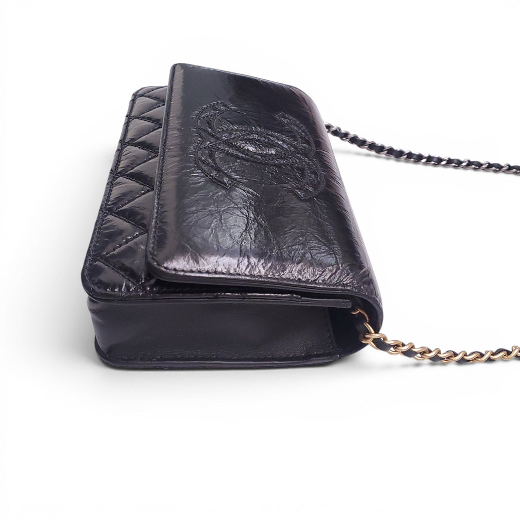 CHANEL BLACK AGED LEATHER WALLET ON MIXED METAL CHAIN