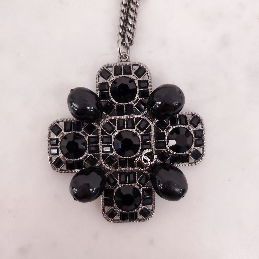 CHANEL BLACK CRYSTAL CROSS WITH LOGO