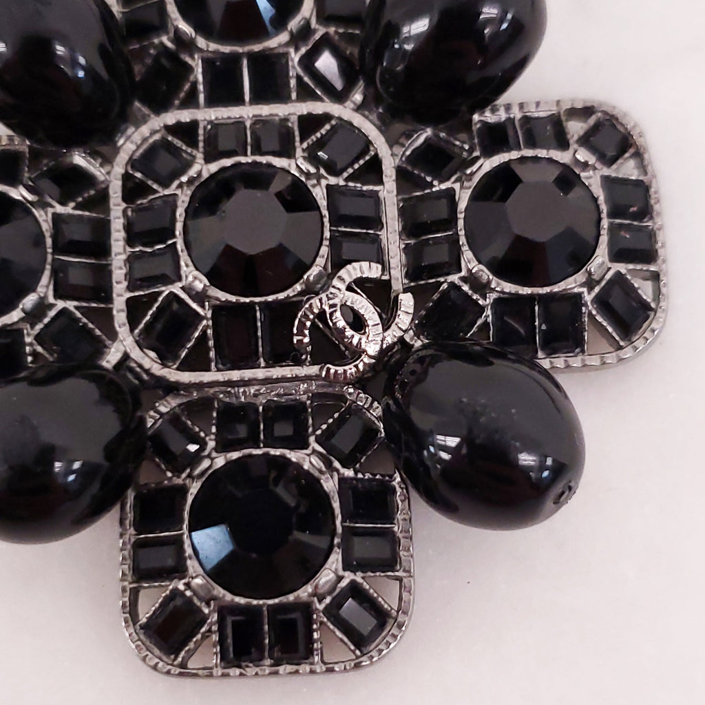CHANEL BLACK CRYSTAL CROSS WITH LOGO
