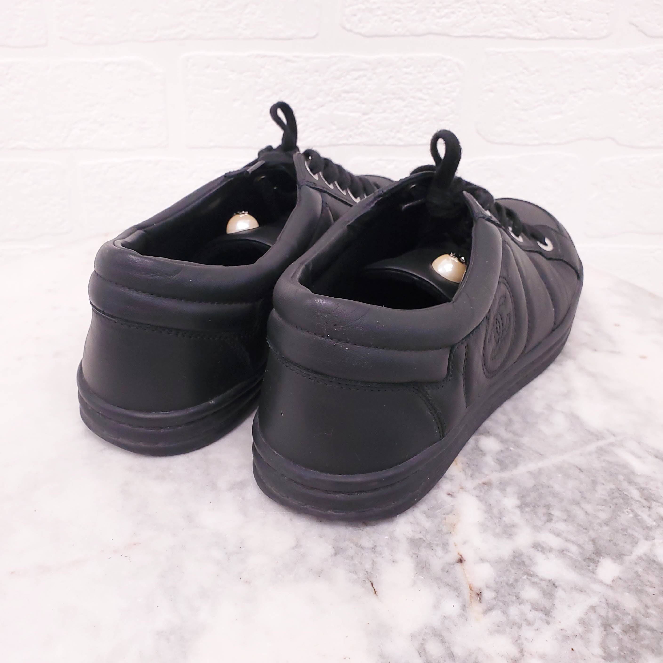 CHANEL BLACK SNEAKERS WITH PEARL DETAIL - SIZE 38.5