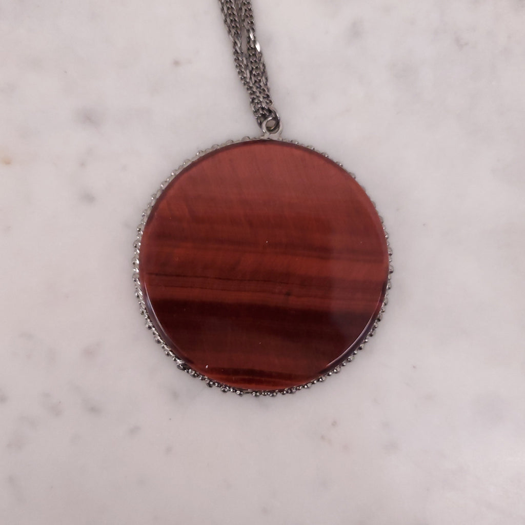 CHANEL BROWN RESIN CIRCLE PENDANT NECKLACE WITH LOGO