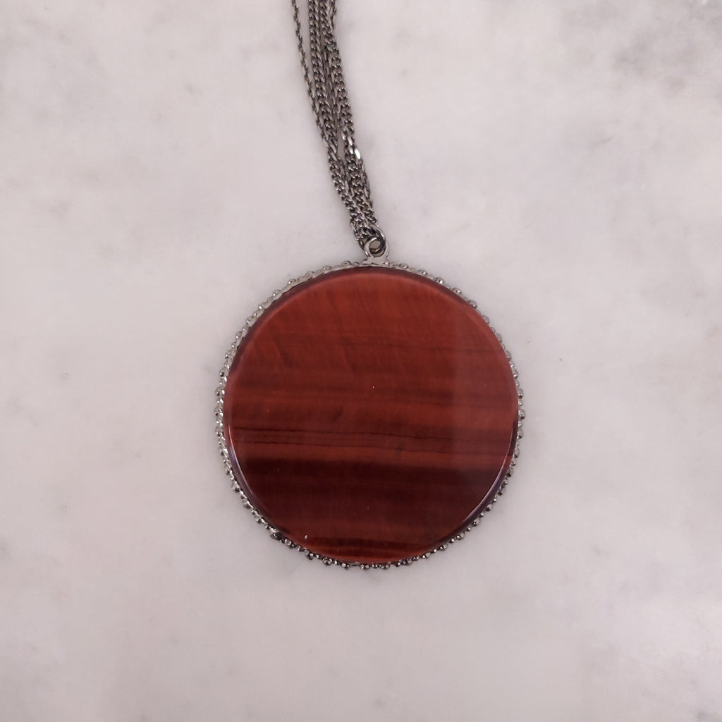 CHANEL BROWN RESIN CIRCLE PENDANT NECKLACE WITH LOGO