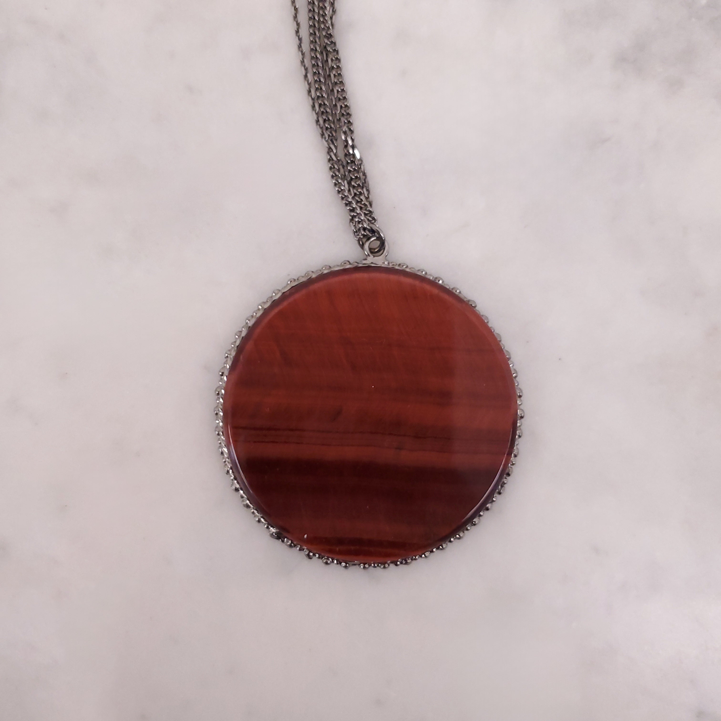 CHANEL BROWN RESIN CIRCLE PENDANT NECKLACE WITH LOGO