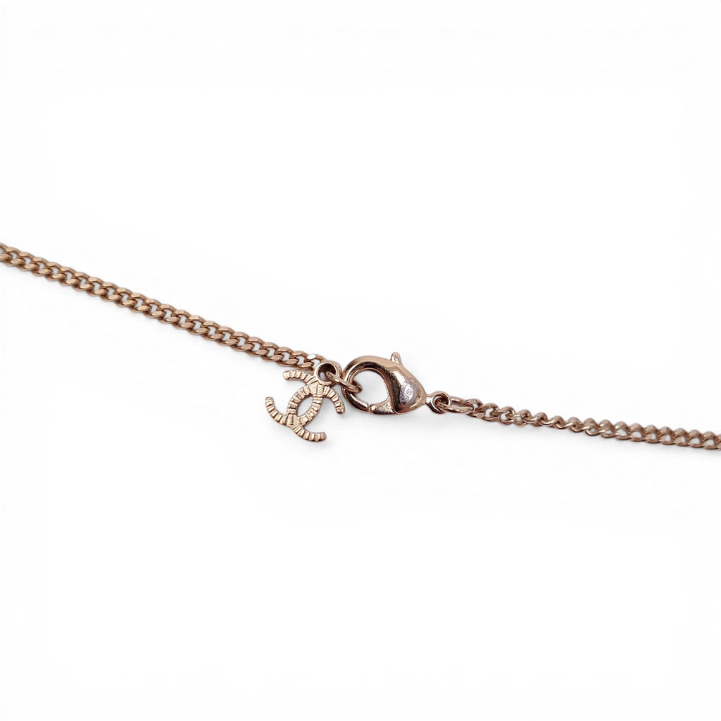 CHANEL GOLD AND SILVER CRYSTAL LOGO NECKLACE