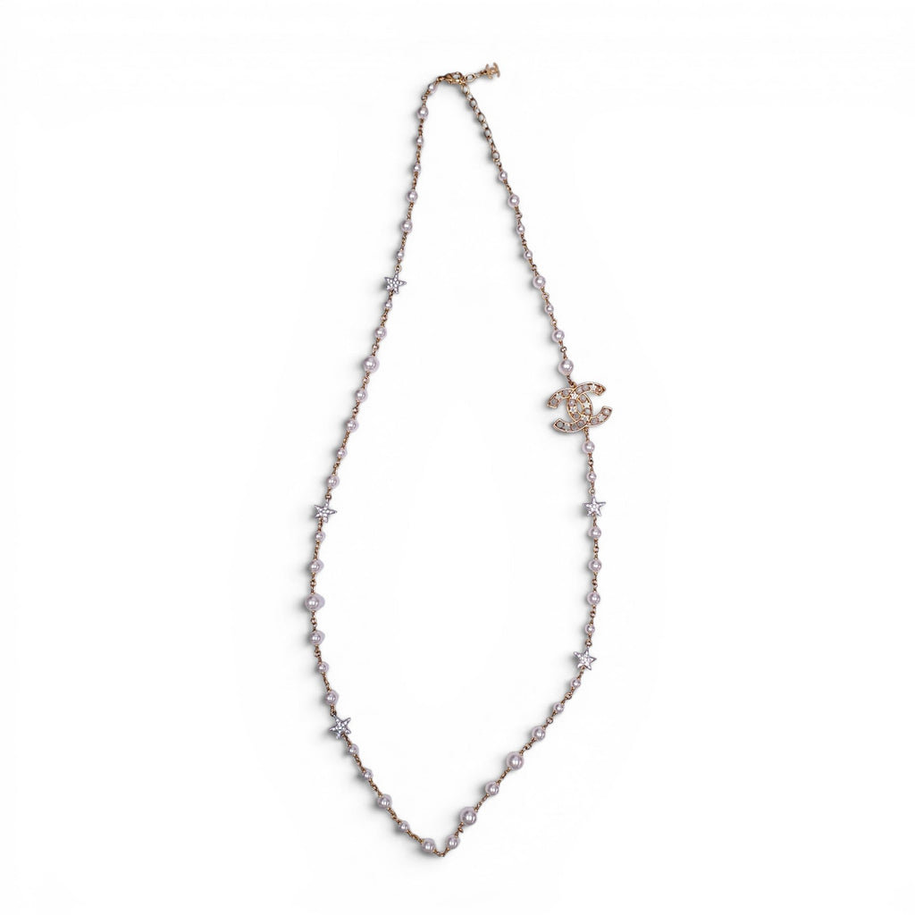 CHANEL GOLD NECKLACE WITH CREAM PEARLS, STARS, AND CC LOGO