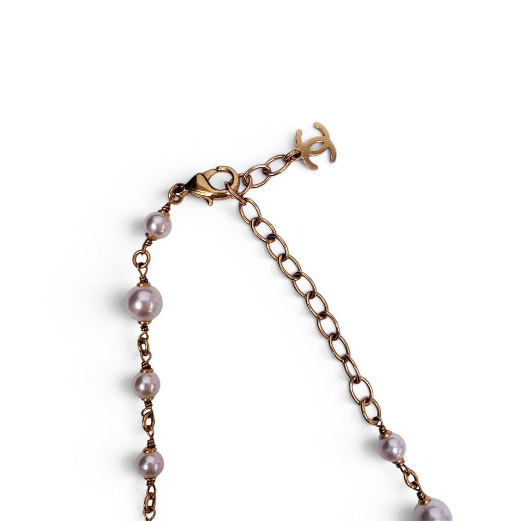 CHANEL GOLD NECKLACE WITH CREAM PEARLS, STARS, AND CC LOGO
