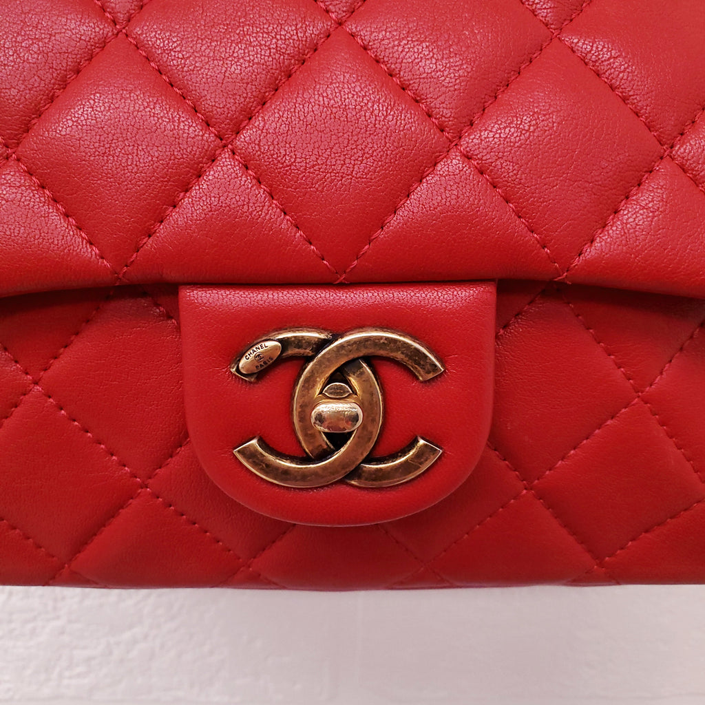 CHANEL RED QUILTED FRONT POCKET CAMERA BAG