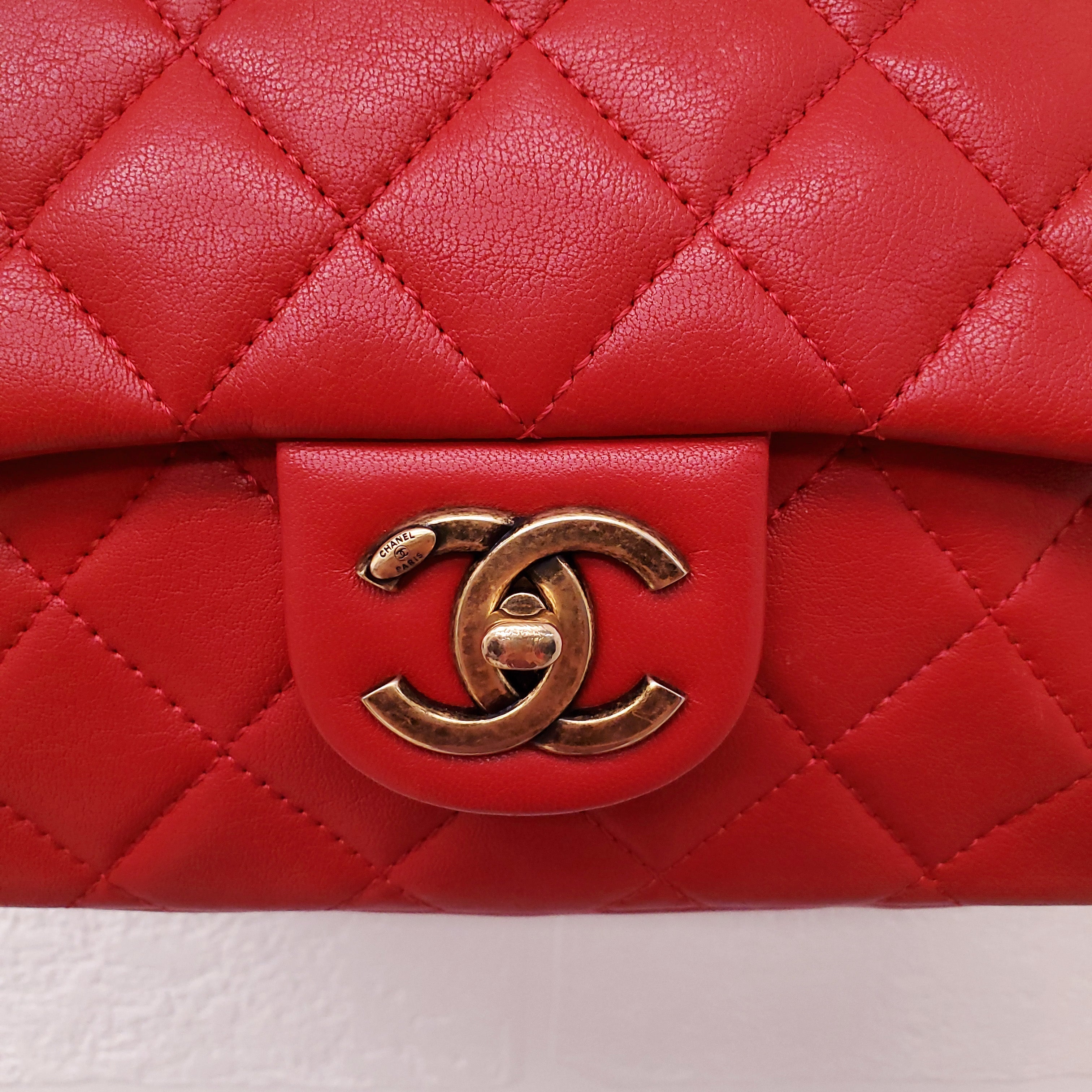 CHANEL RED QUILTED FRONT POCKET CAMERA BAG