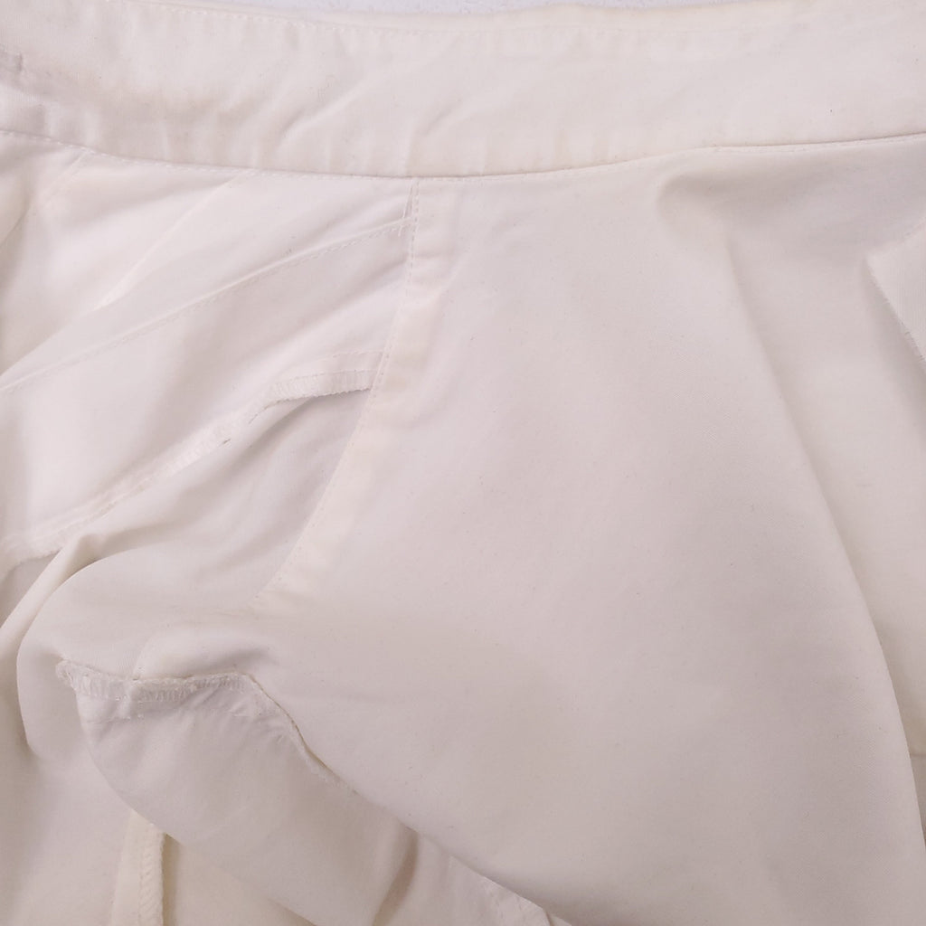 CHANEL WHITE TUXEDO BLOUSE WITH CC PEARL BUTTONS - SIZE 38