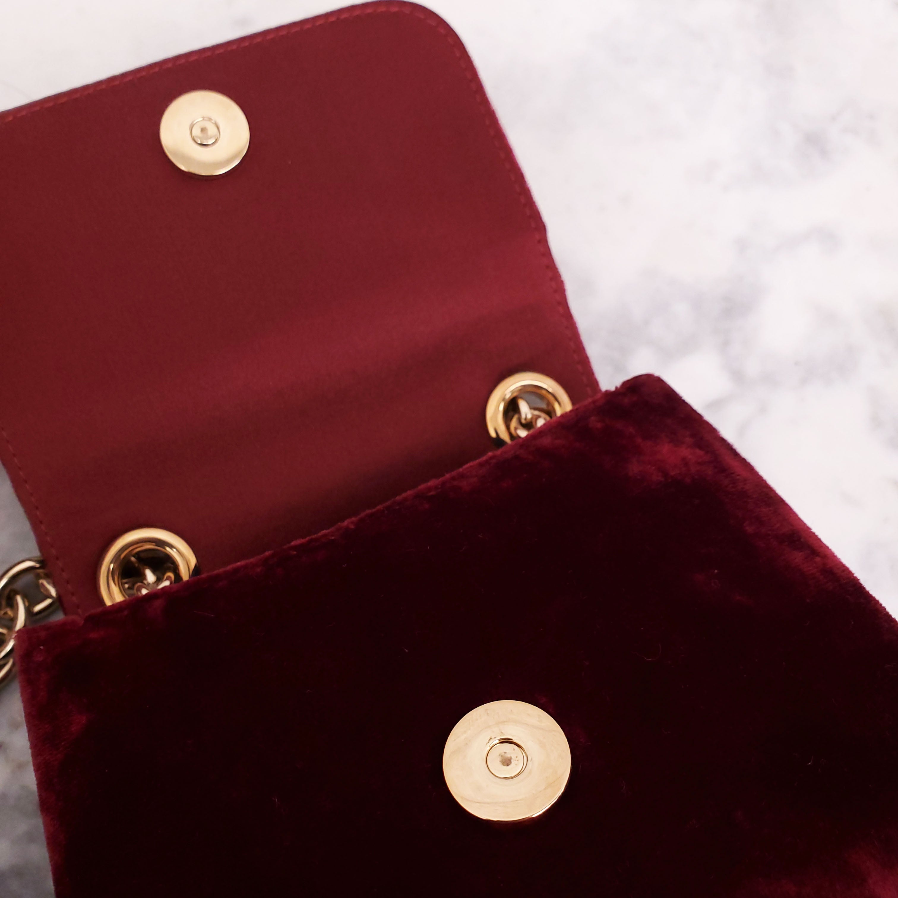DOLCE & GABBANA BURGUNDY VELVET SHOULDER BAG WITH CRYSTAL EMBLEM