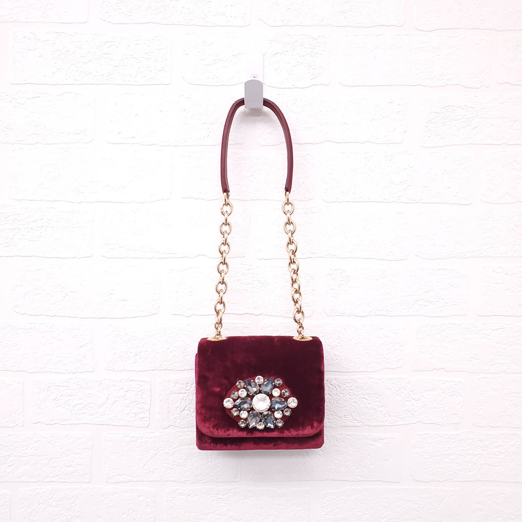DOLCE & GABBANA BURGUNDY VELVET SHOULDER BAG WITH CRYSTAL EMBLEM
