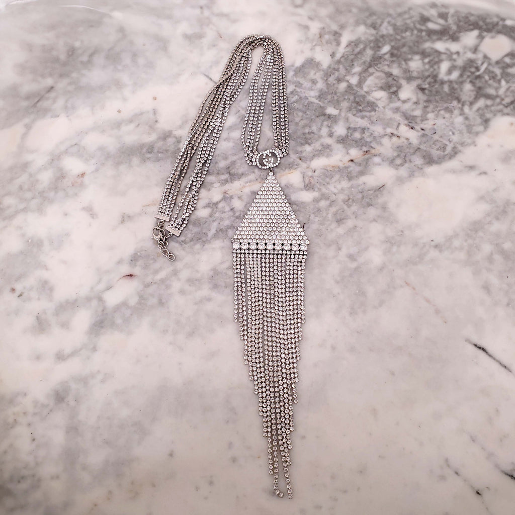 GUCCI CRYSTAL LOGO TRIANGLE FRINGE NECKLACE