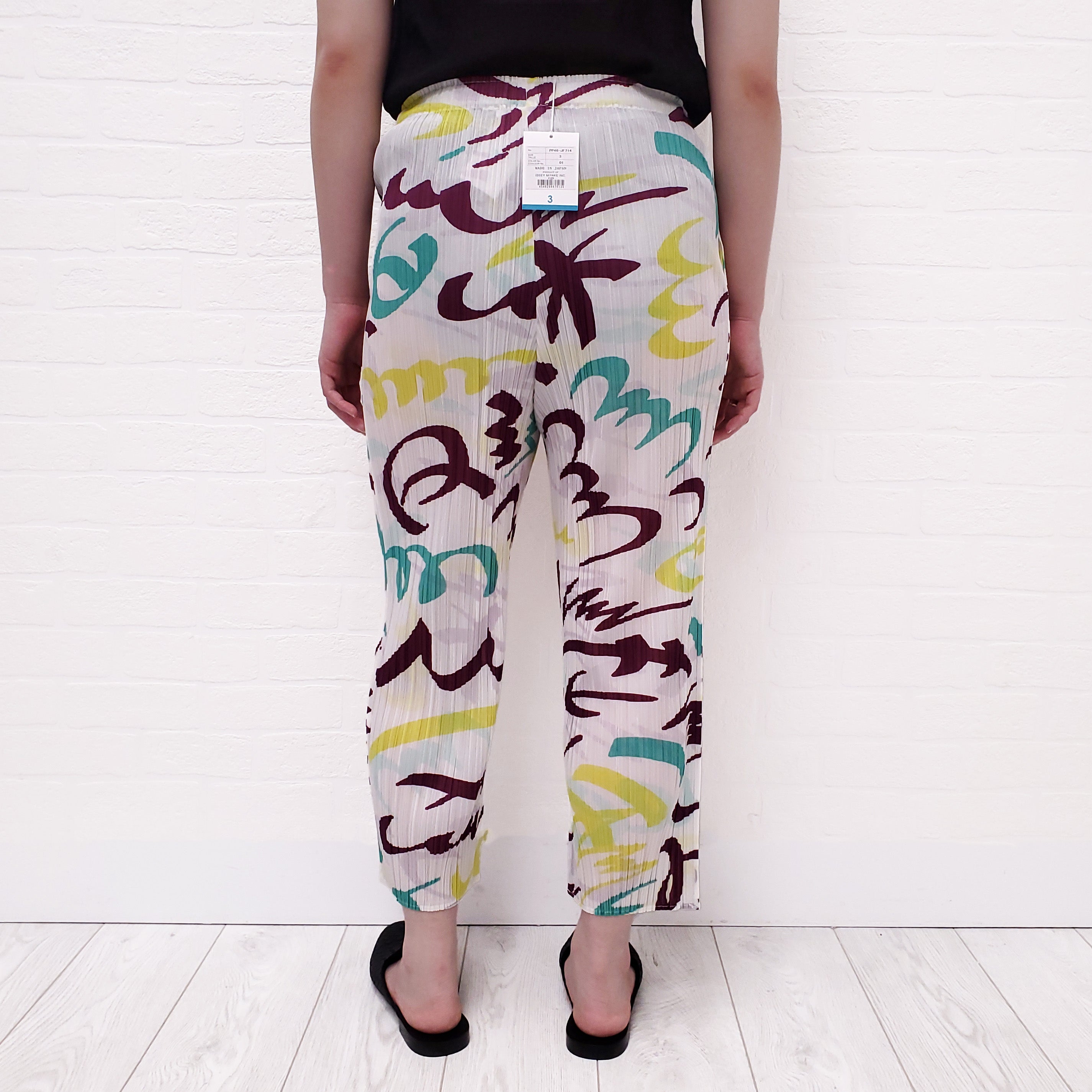 ISSEY MIYAKE WHITE FIZZY PLEATED PANTS - SIZE 3/M