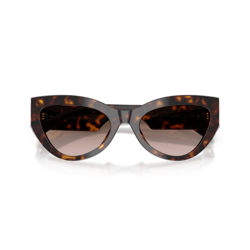 Cat-Eye Sunglasses With Tortoiseshell Frame And Gold Embellishments