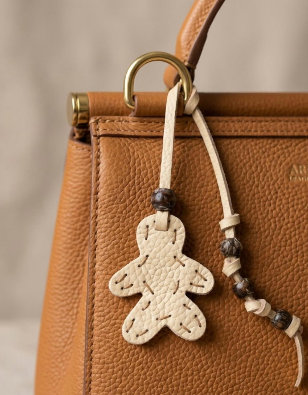 Women's Little Men Bag Charms In Taupe