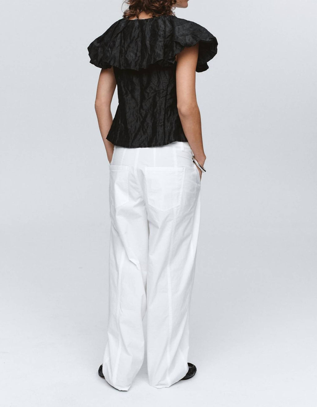 Andre Textured Ruffle Top In Black