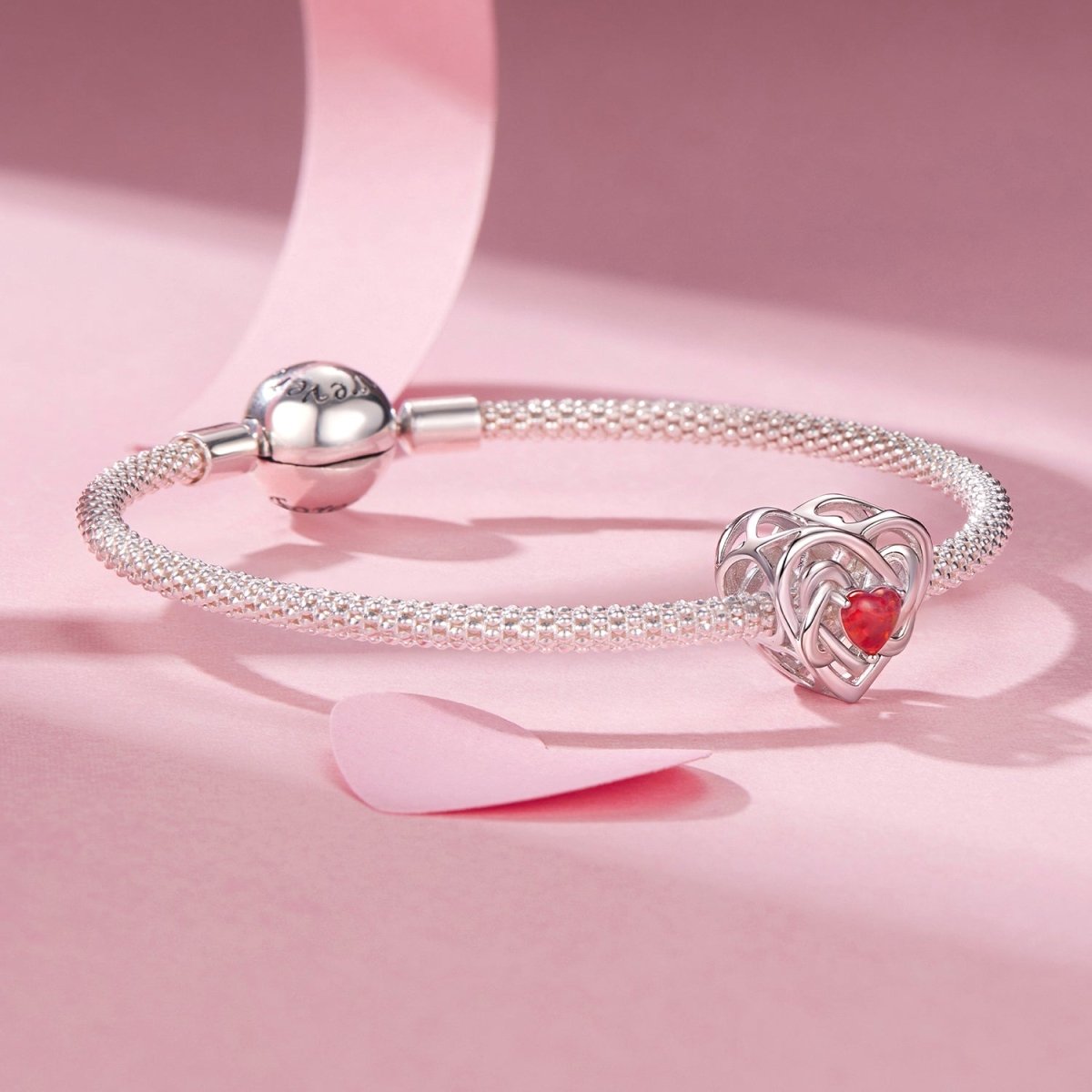 Fiery Opal Love Knot Charm